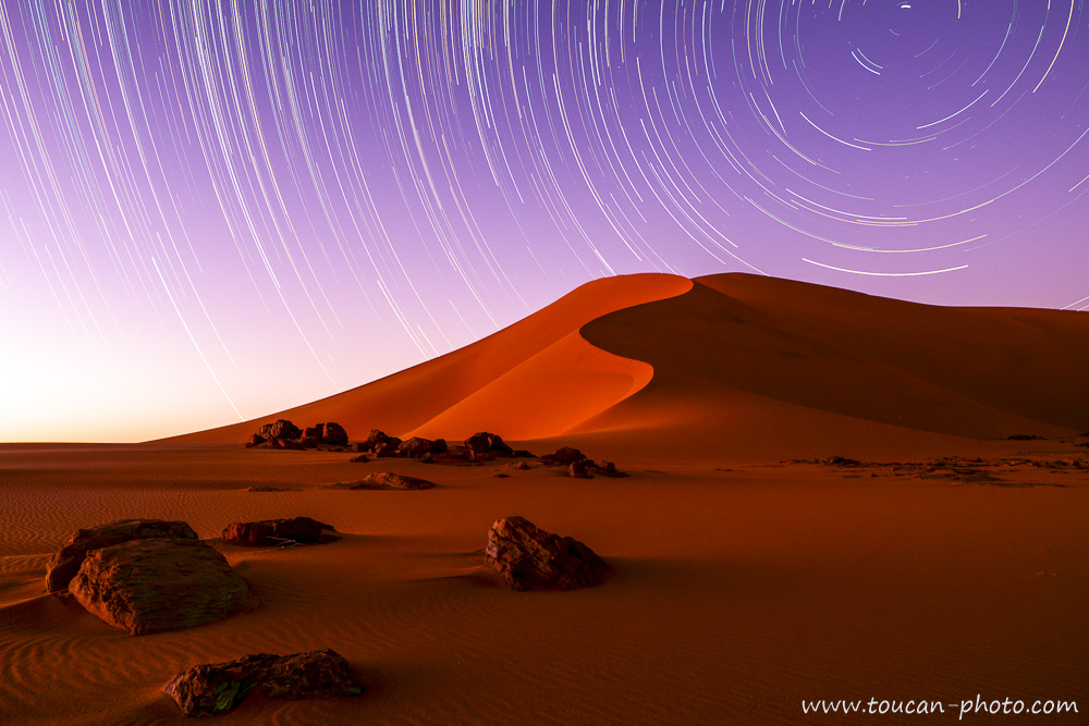 Star trail over the dunes of Imidir, Algeria